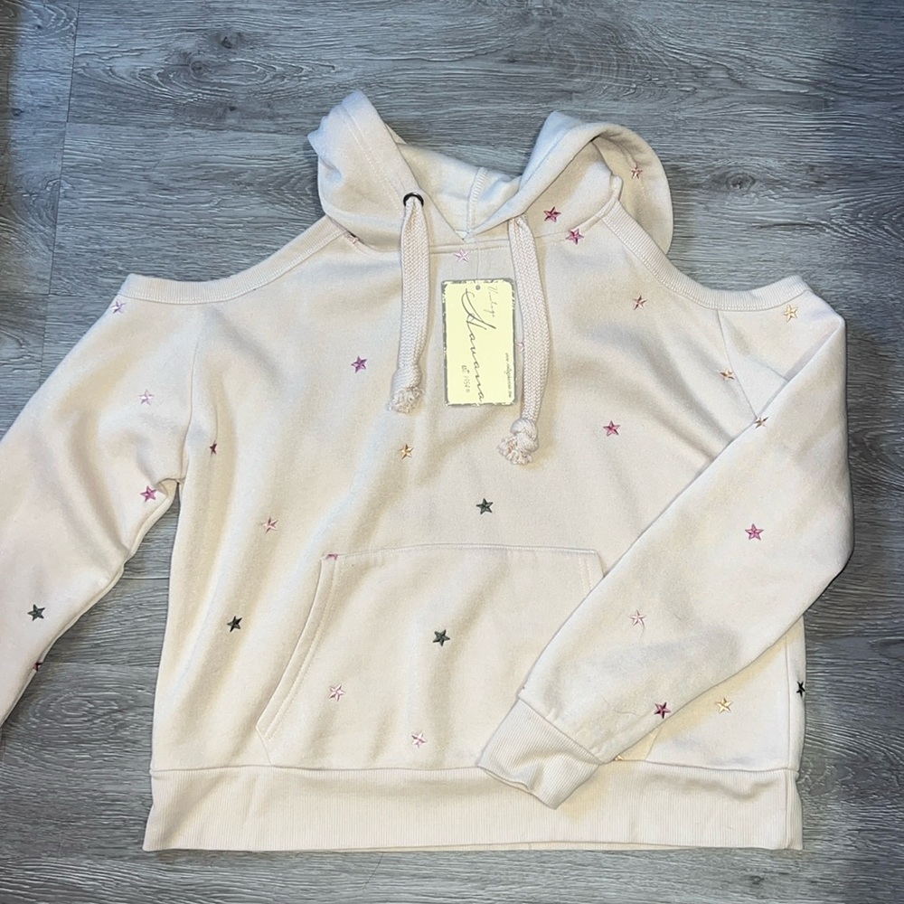 Cream cut out shoulder hoodie with stars